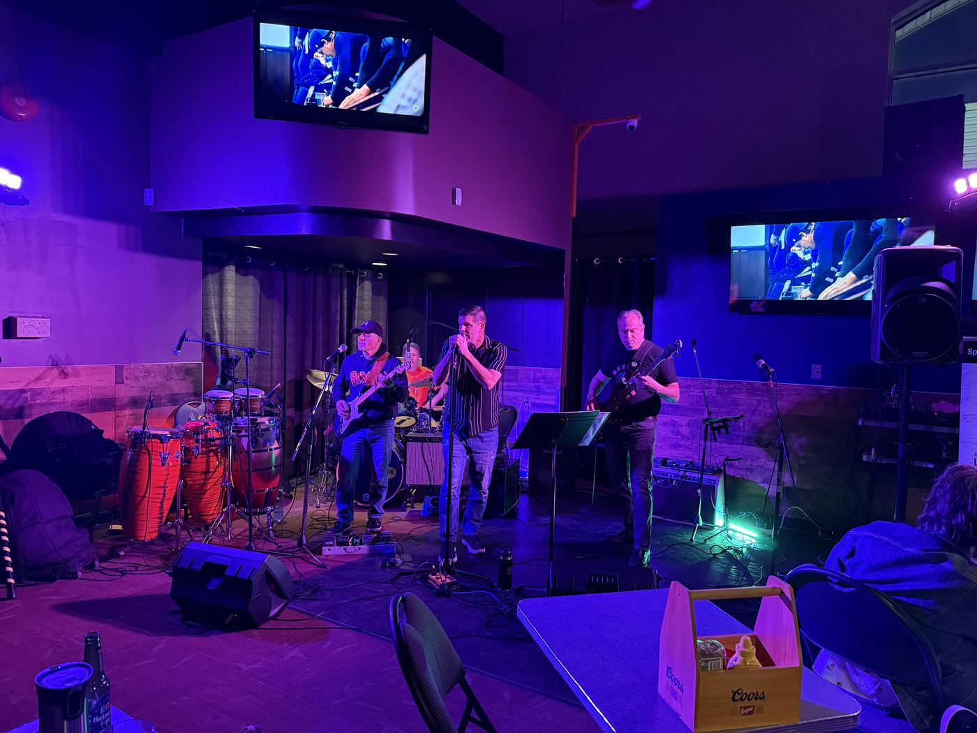 Decibel Crush live — crowd and stage lights